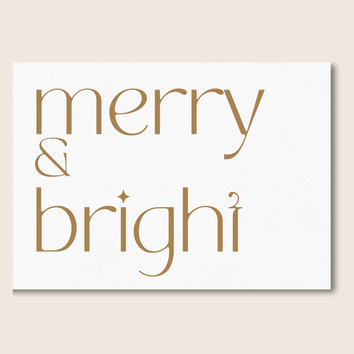 Christmas card with Merry and Bright gold text on white background.