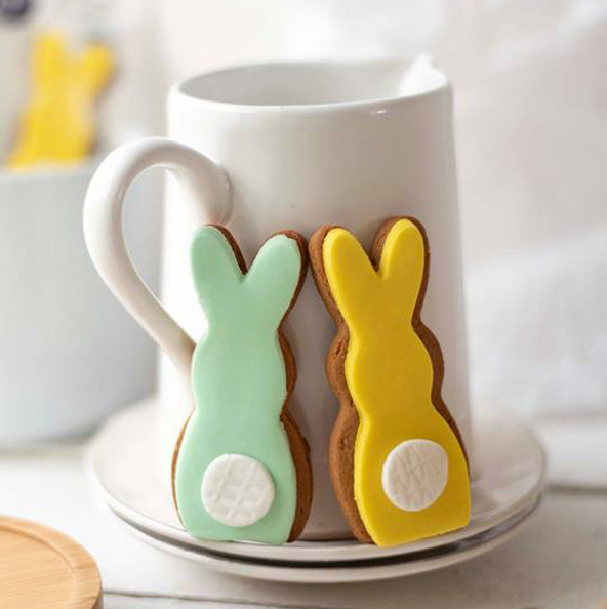 Handmade Molly Woppy gingerbread bunny cookie with bright yellow icing