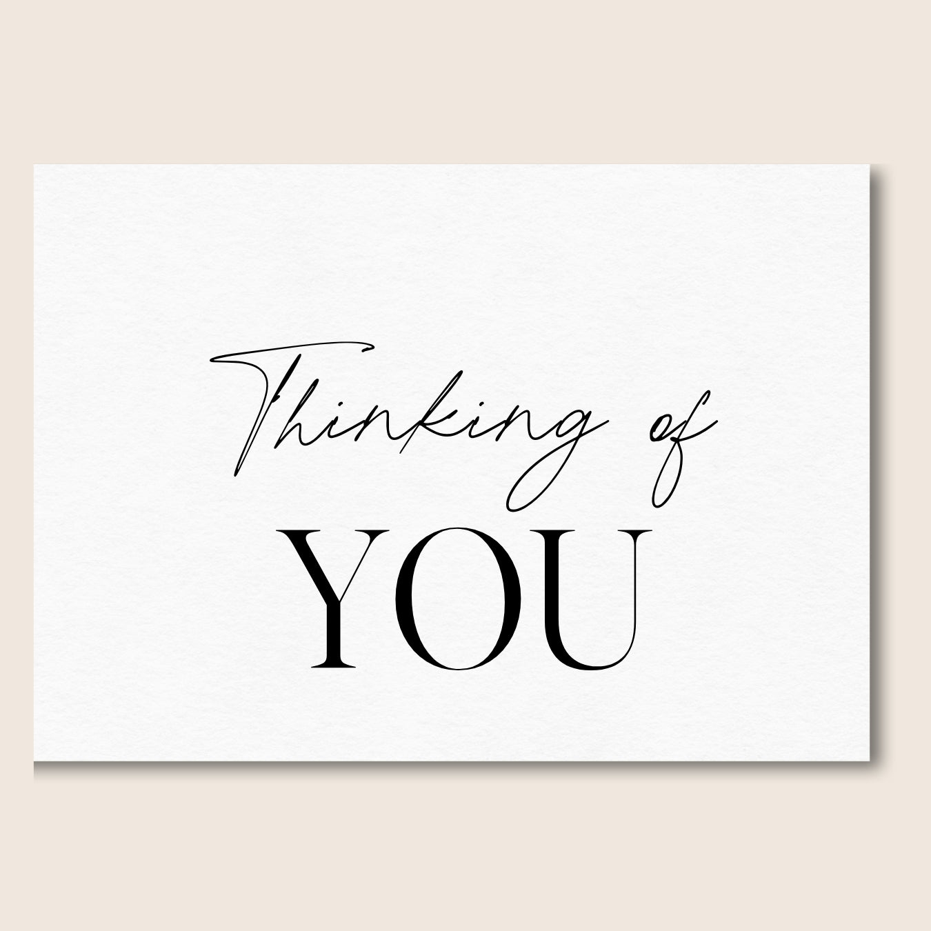 Black and white greeting card with Thinking of You text.