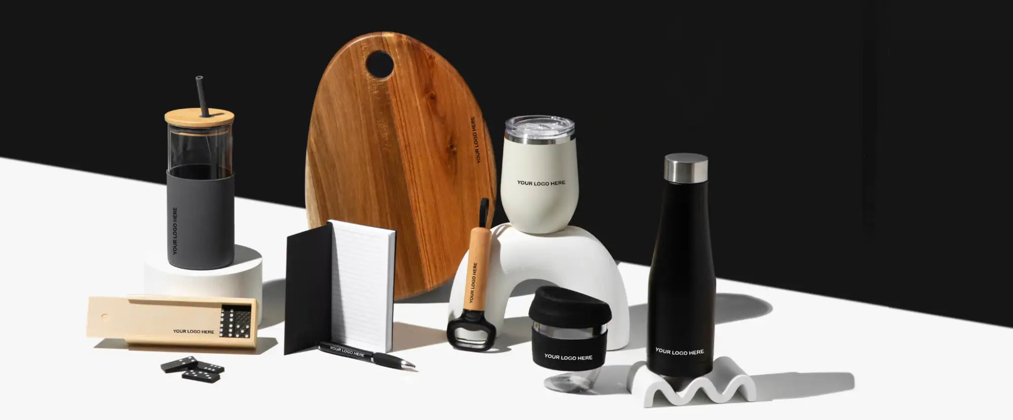 Black stainless steel water bottle with a silver screw-on cap and sleek, minimalist design
