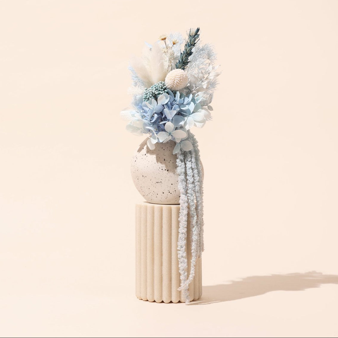 Layla blue dried flower arrangement in handmade vase